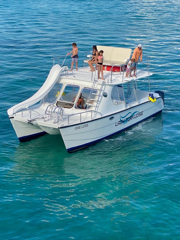 Charter boat anchored in clear turquoise water